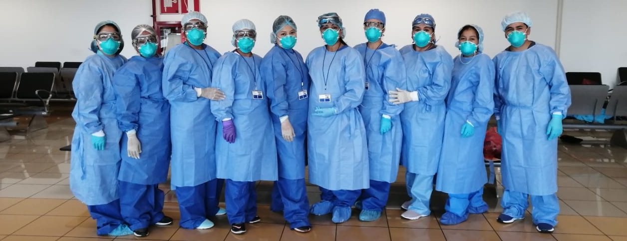 Nurses in protective gear 