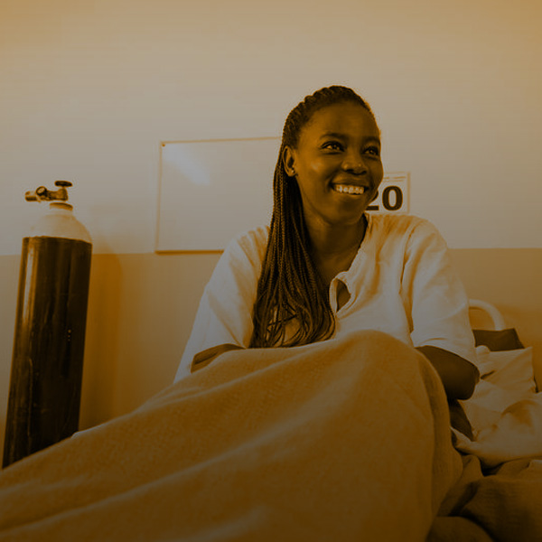 Patient Sarafina Makashane receives a visit from doctors