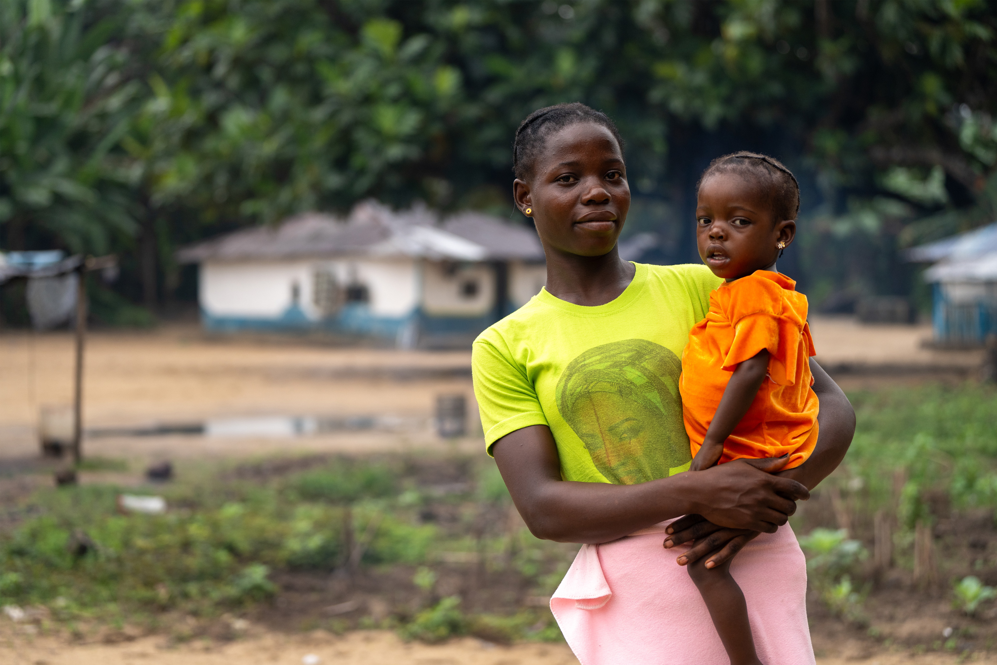 Woman holding child in Liberia