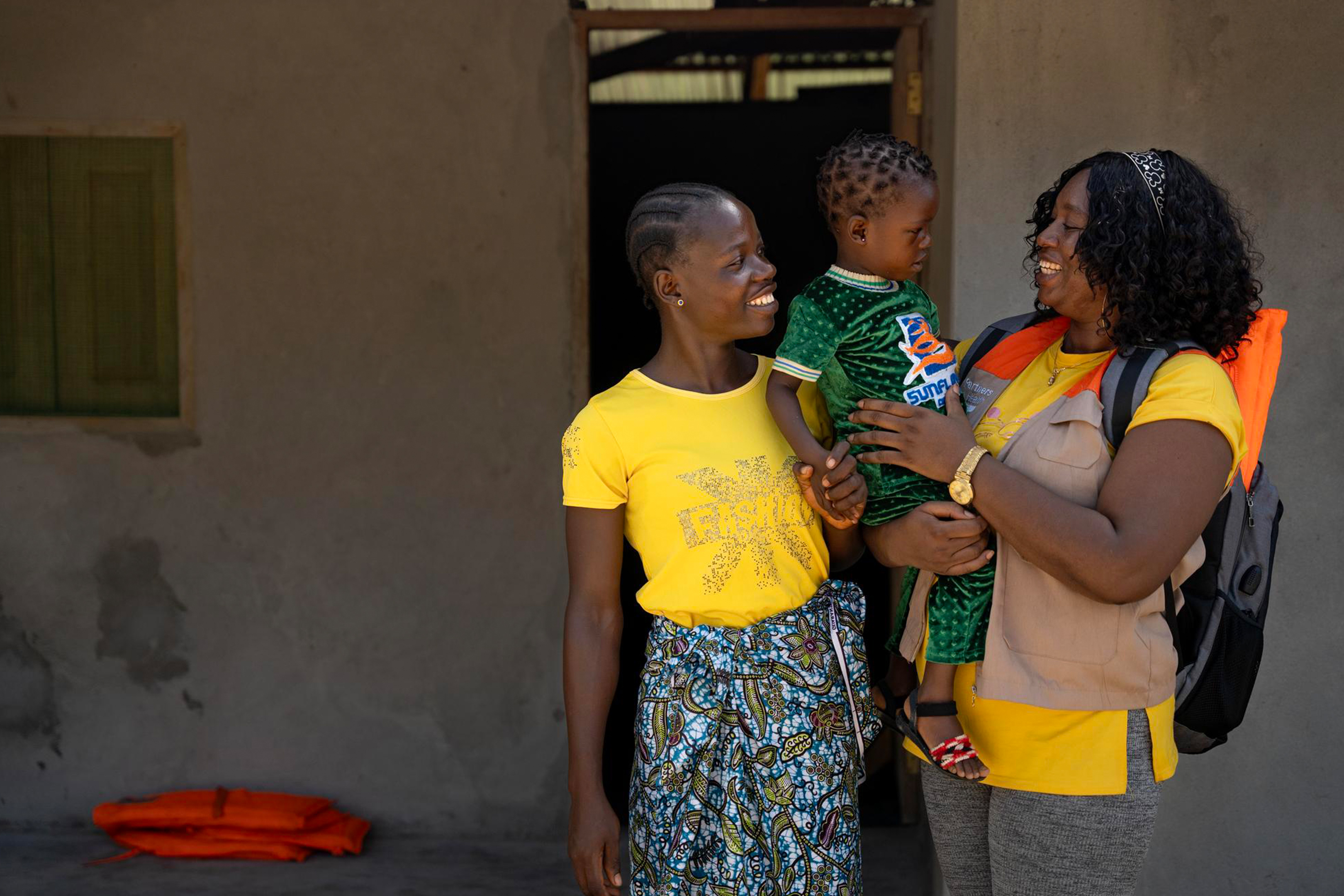 CHW with family in Liberia