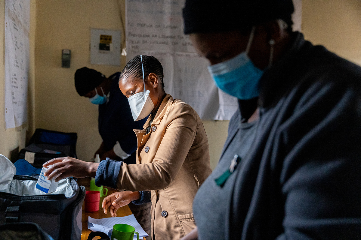 treatment supporters prepare tb medication packages