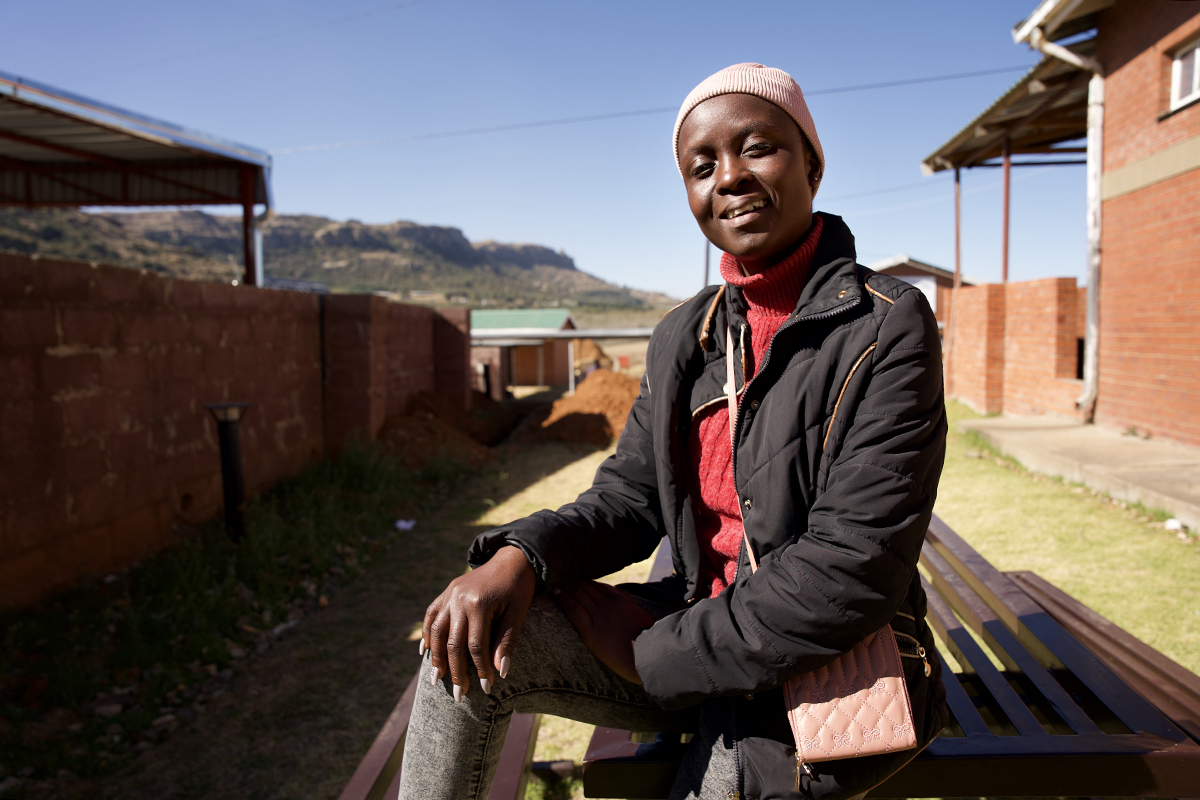 Lerato Mpholo smiling outside Botsabelo Hospital