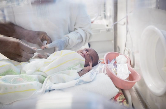 A baby in a neonatal ICU