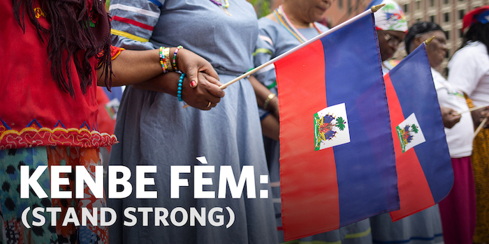 Women holding the Haiti flag