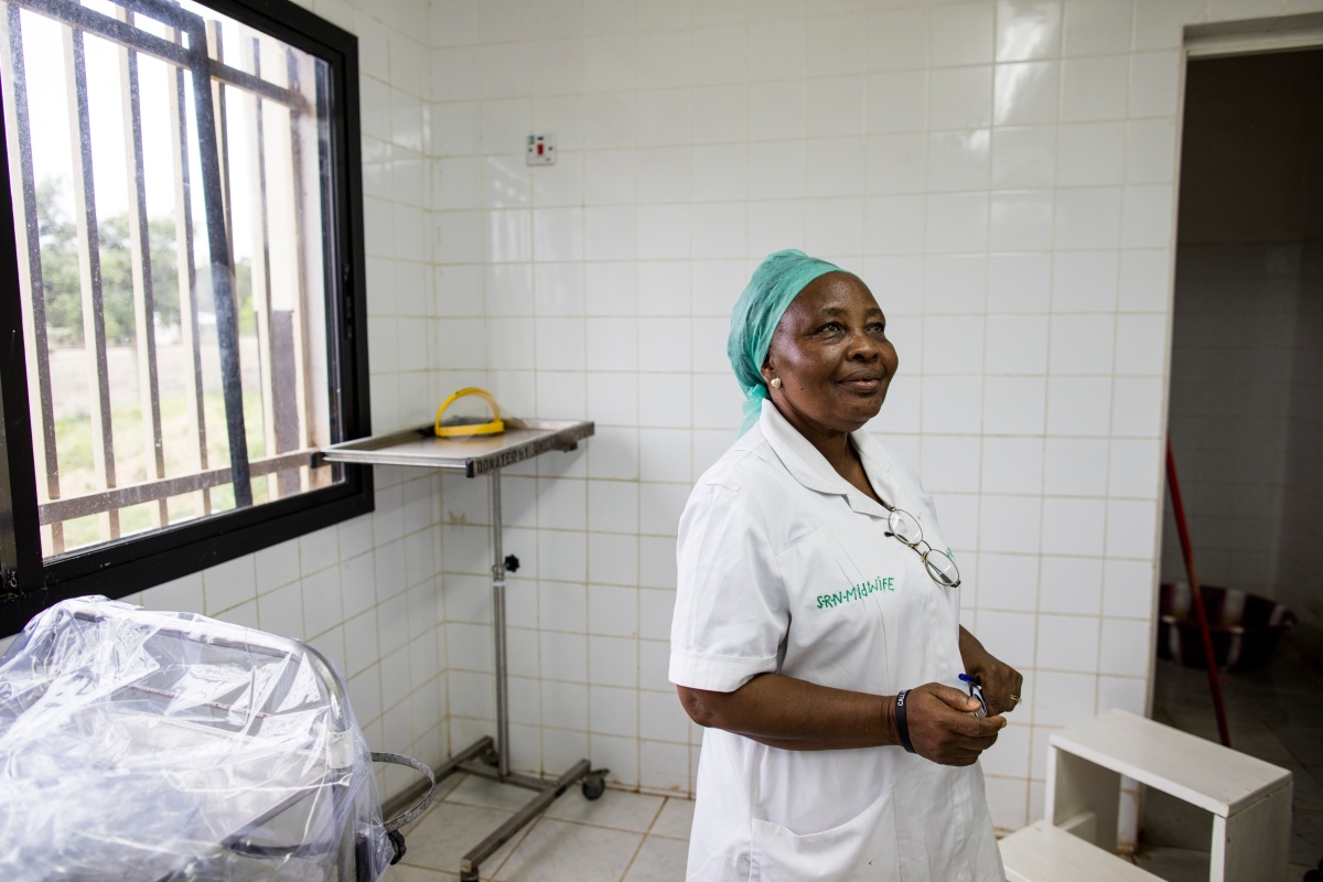 Sister Agnes Matturie, midwife in charge of managing the maternity ward at Koidu Government Hospital in Sierra Leone, stands in the ward's upgraded operating room.