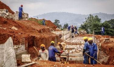 Workers lay UGHE foundations in October 2017