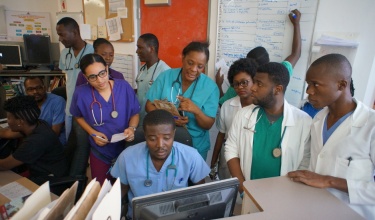 Emergency department shift change at University Hospital in Mirebalais, Haiti