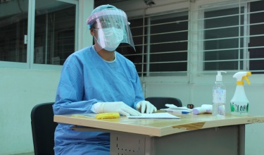 A nurse hired by CES wearing PPE in the triage area of the Basic Community Hospital Angel Albino Corzo in Jaltenango.