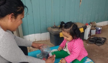 Rocío Salas and her daughter, Valentina, practice skills learned through The CASITA Project. Photo courtesy of Socios En Salud.