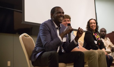 Dr. Melino Ndayizigiye speaks at a cross-site PIH event in 2017