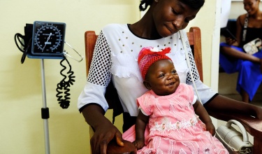 mother and her infant at a maternal health clinic in Sierra Leone