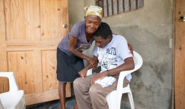 Janel with his mother in Haiti 