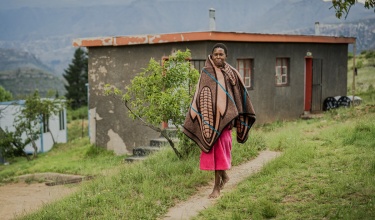 Ntsoane Mofao stands outside